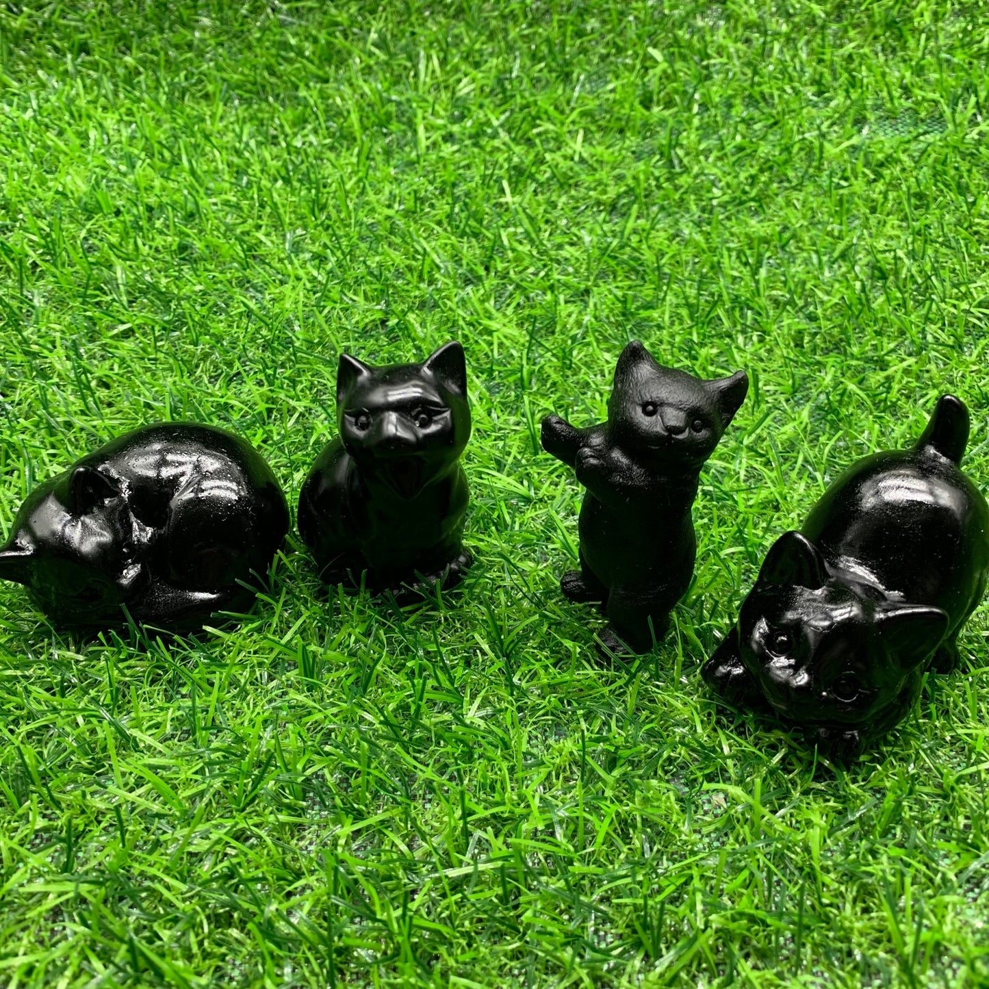 Animal Four cat obsidian carving